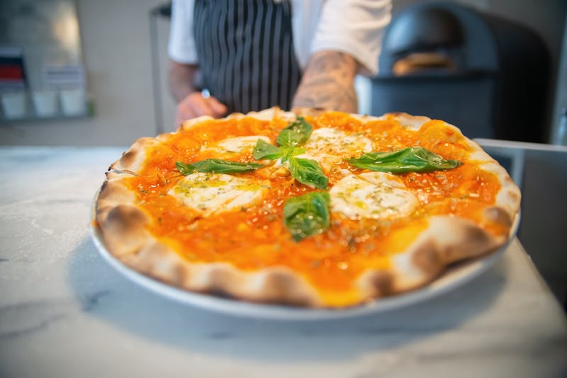 Uppercut Truffle pizza with black truffle oil and wild mushrooms