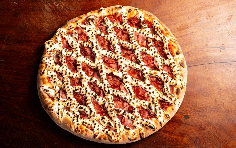 Knockout BBQ Chicken punch pizza with smoky barbecue sauce