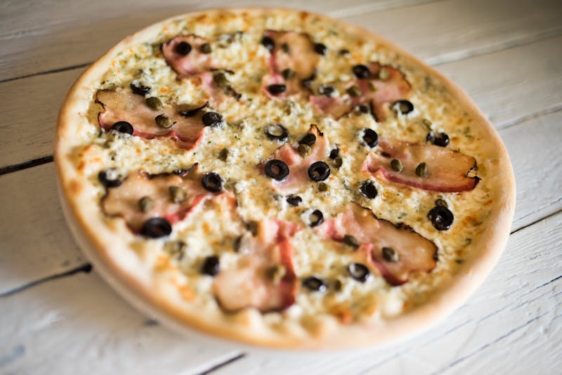 Four Cheese Dream pizza with melted mozzarella gorgonzola provolone and ricotta
